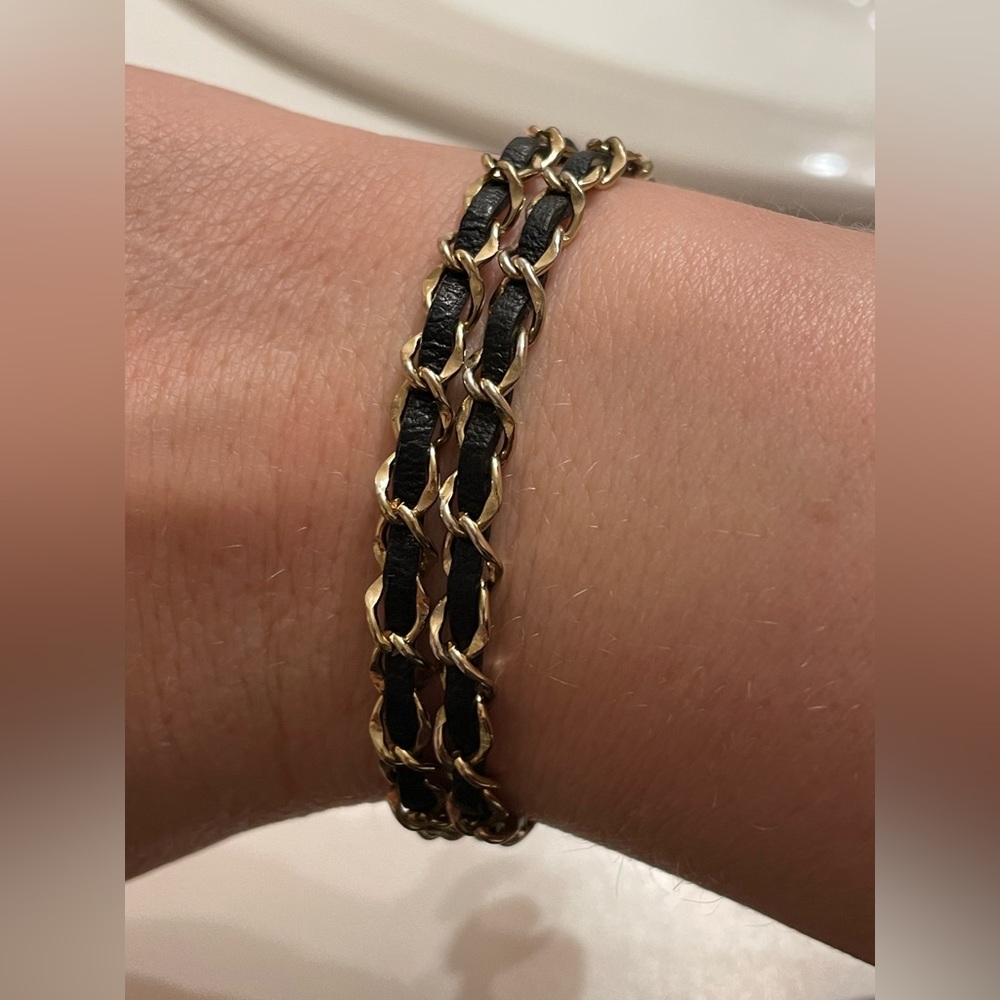 Black rope gold toned double loop bracelet